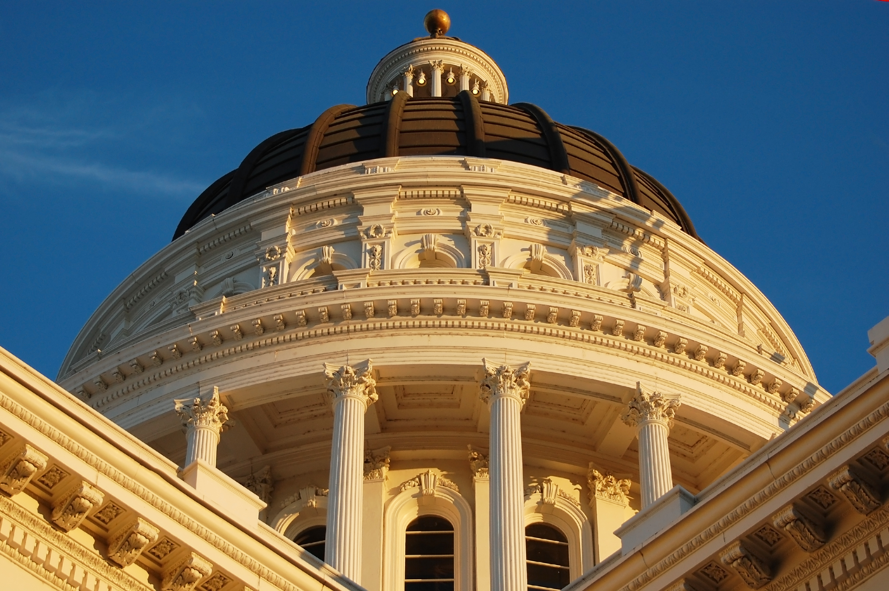 California state capitol building during sunset with a blue sky